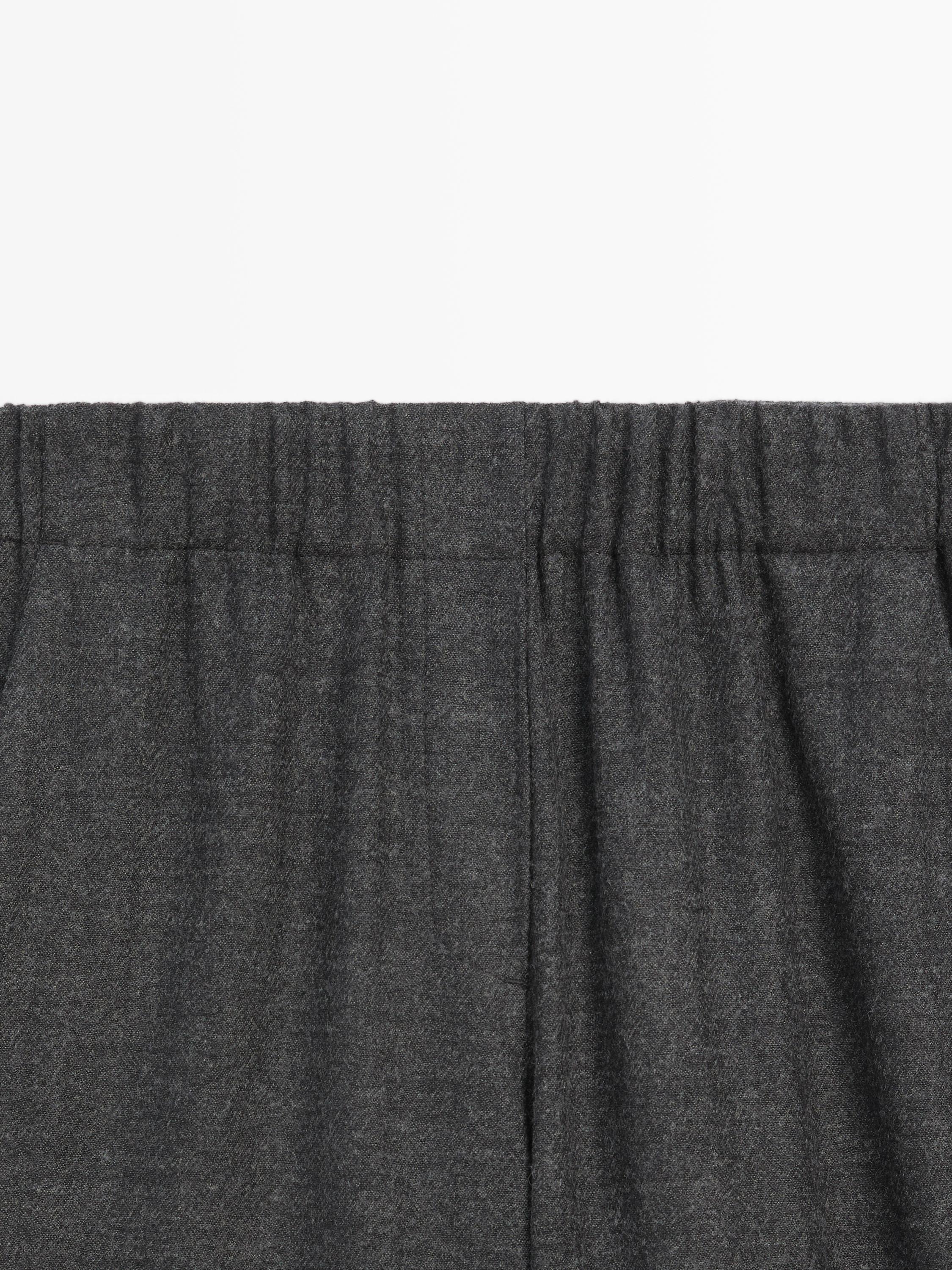 100% wool wide-leg textured trousers